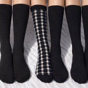 Six knee high socks. Female. Solid Black/Pattern.
